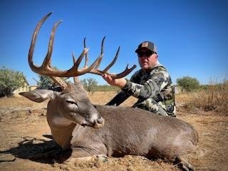 image of hunter with trophy deer